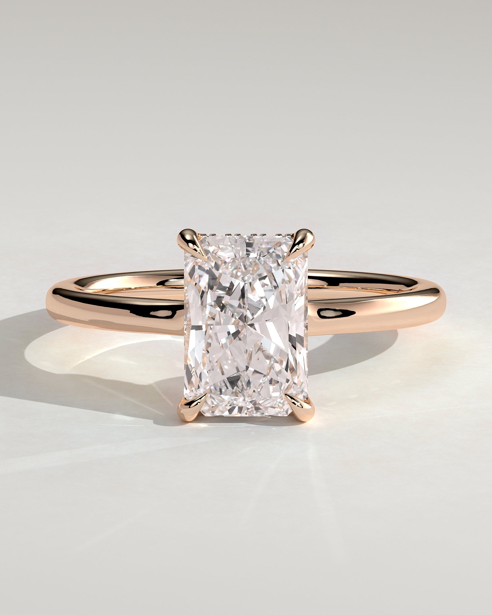 CAPRICARATS 2.00Ct Radiant Cut Moissanite Floating Low-Set Solitaire Engagement Ring – Hidden Halo Flush Design in 18K Rose Gold for Women