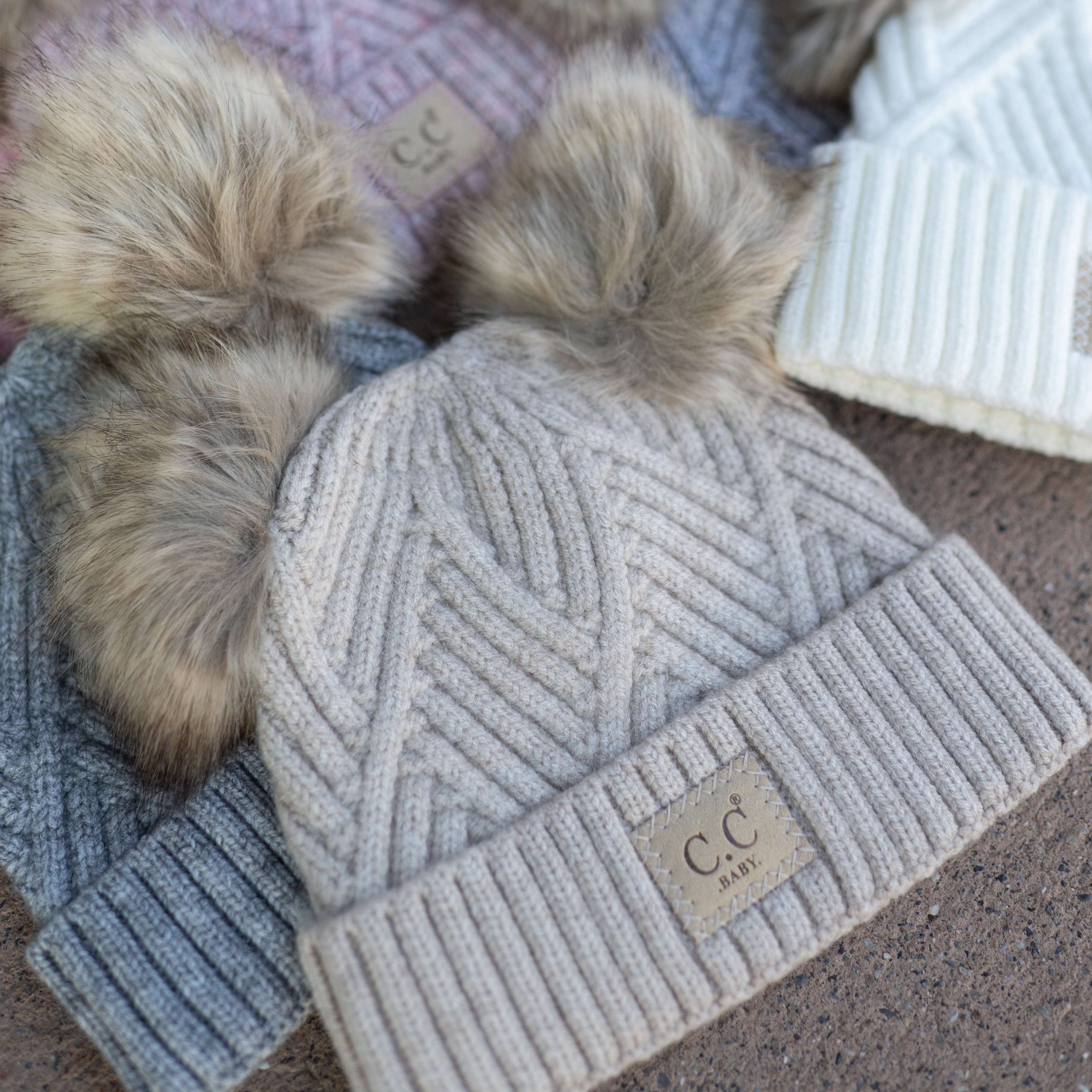 CC Baby Double Pom Winter Beanie - Criss-Cross Pattern, Fits Newborn to 9 Months, Soft & Cozy Baby Hat with Plush Pom, Authentic CC Brand - Soft, Warm Hats for Babies and Toddlers - Cozy Winter Wear