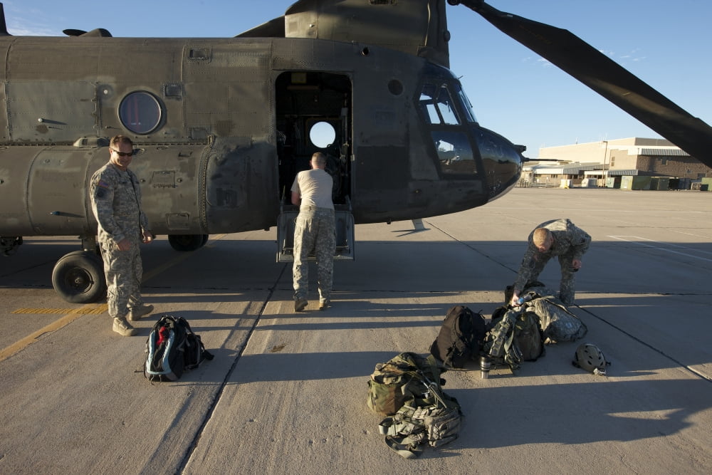 CH-47 Chinook crew preparing to load up for their mission Canvas Art - Terry MooreStocktrek Images (35 x 23)