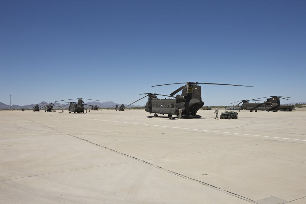 CH-47 Chinook helicopters parked on the tarmac Canvas Art - Terry MooreStocktrek Images (18 x 12)