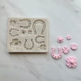 thumbnail image 1 of CLOVERS & HORSESHOES BAKING MOLD FOR CUPCAKES, CAKEPOPS, CHOCOLATE STRAWBERRIES, PRETZELS & RICE KRISPIES, 1 of 2