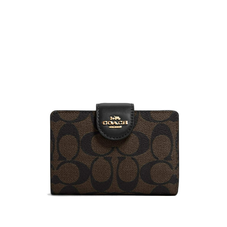 Coach zippy wallet in signature fabric hotsell