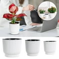 thumbnail image 1 of COM1950s Self Watering Plant Pot,Resin Planter for Tabletop with Circular Vertical Pattern Design,Automatic Water Absorbing Indoor Flower Pot for Roses Succulents and Small Plants,Easy Clean, 1 of 9