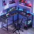 thumbnail image 1 of CONCETTA 49 Inch Modern L Shaped Computer Desk with Lower Storage Shelf & Side Bag, Two-Way Convertible Corner Gaming Table for Home Office, Black, 1 of 8