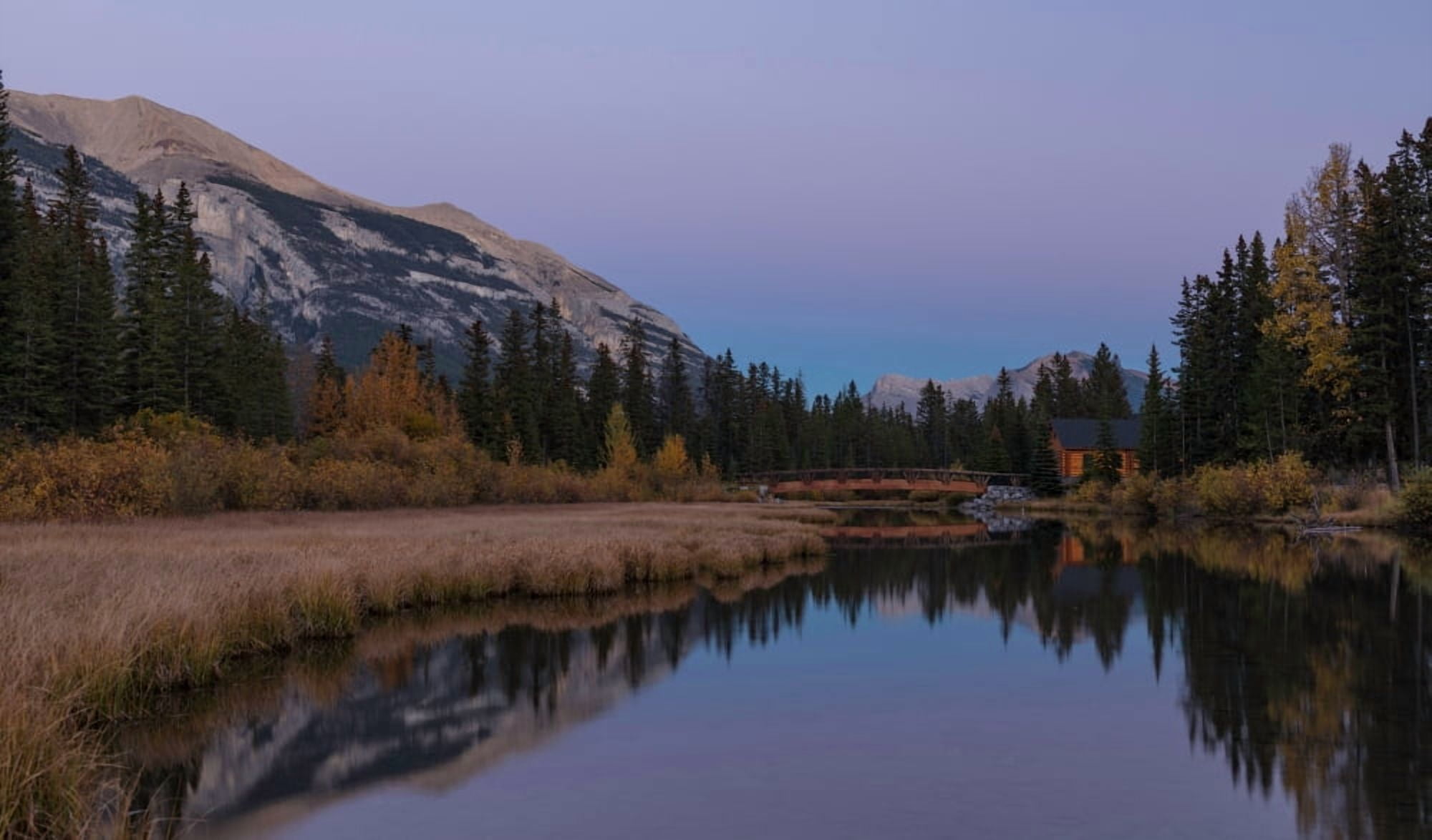 Cabin and bridge on Policemans Creek Pigeon Mountain Grotto Mountain Canmore Alberta Canada Canvas Art - Panoramic Images (24 x 40)