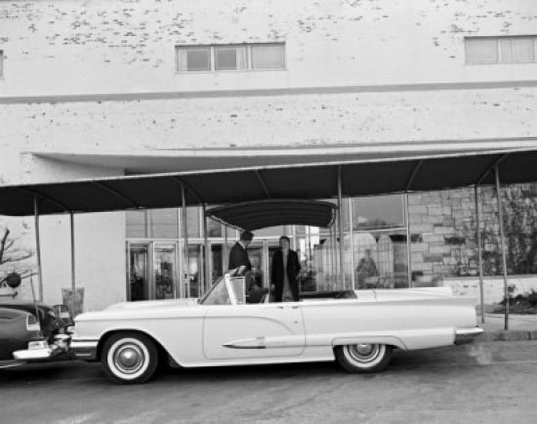 Cabriolet parked by entrance Canvas Art - (24 x 36)