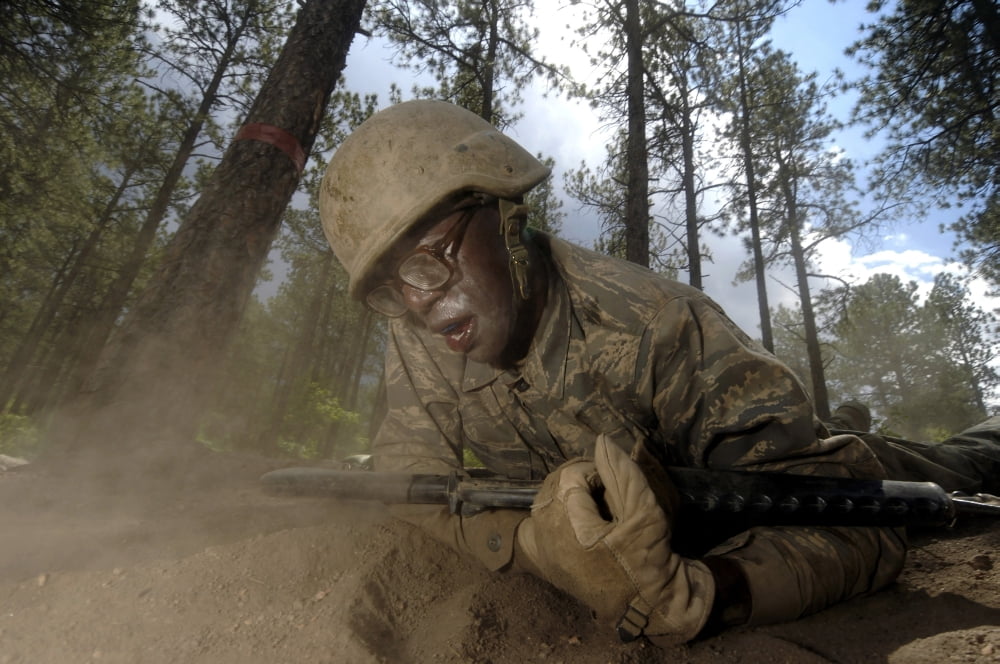 Cadet crawls down a section of an assault course Canvas Art - Stocktrek Images (34 x 23)