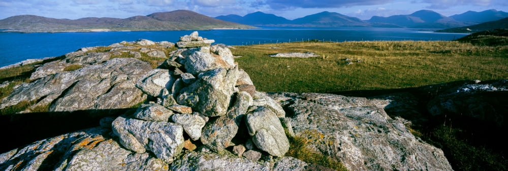 Cairn on top of a coastal hill Taransay South Harris Outer Hebrides Scotland Canvas Art - Panoramic Images (6 x 18)