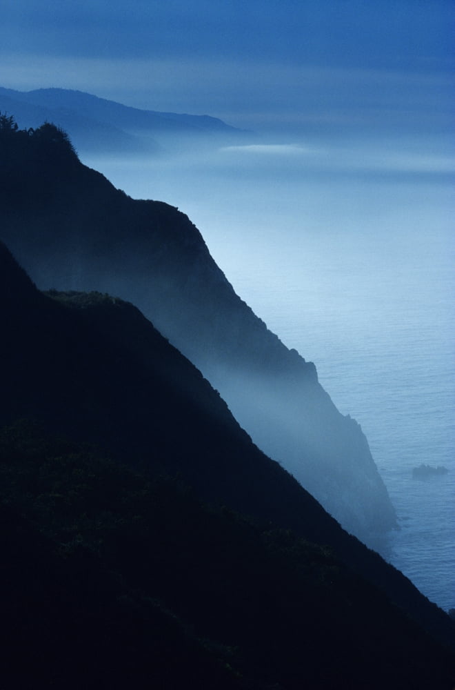 California Big Sur Coast Silhouetted Cliffs Along Foggy Ocean Shoreline Canvas Art - Larry Dale Gordon  Design Pics (22 x 34)