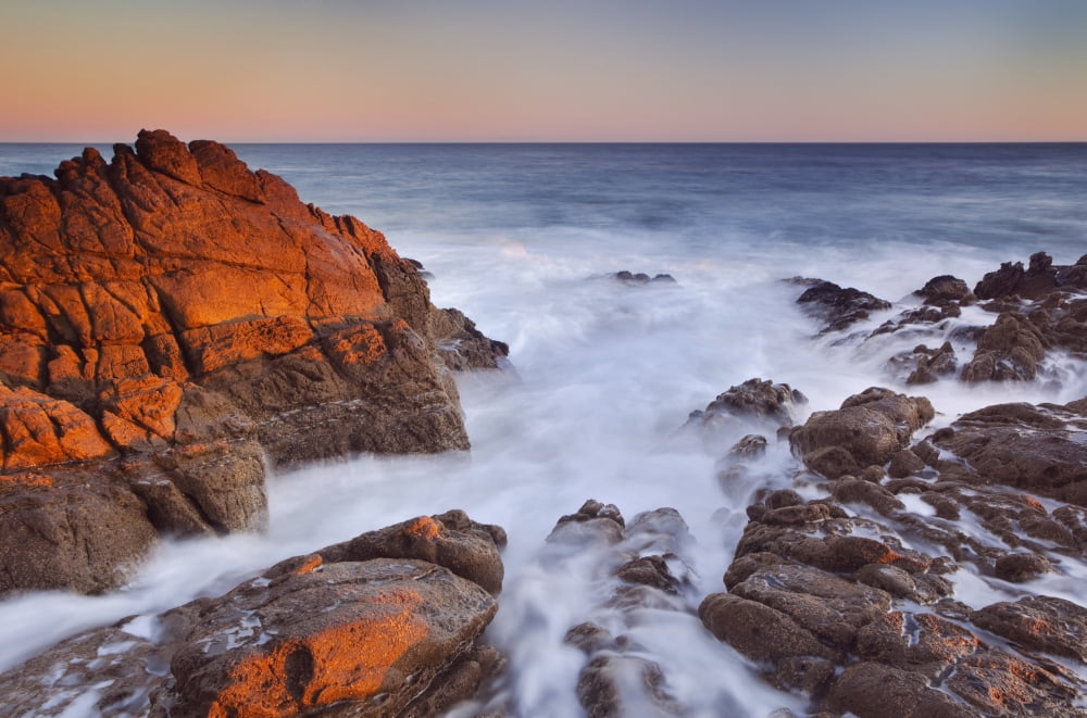 California Malibu Sunset over rocky ocean coastline Canvas Art - MakenaStockMedia Design Pics (17 x 11)