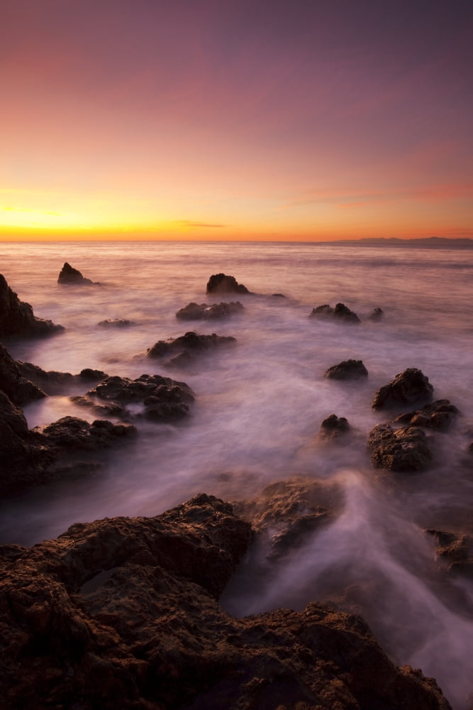 California Malibu Sunset over rocky ocean coastline Canvas Art - MakenaStockMedia Design Pics (24 x 36)
