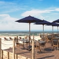 thumbnail image 1 of California Umbrella 7.5' Grove Series Patio Umbrella With Wood Pole Hardwood Ribs  Push Lift With Pacifica Navy Fabric, 1 of 5