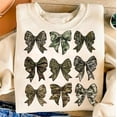 thumbnail image 1 of Camo Coquette Bow Sweatshirt, Retro Camouflage Crewneck, Trendy Aesthetic Pullover, Cute Camo Top, Coquette Style Sweatshirt, 1 of 5