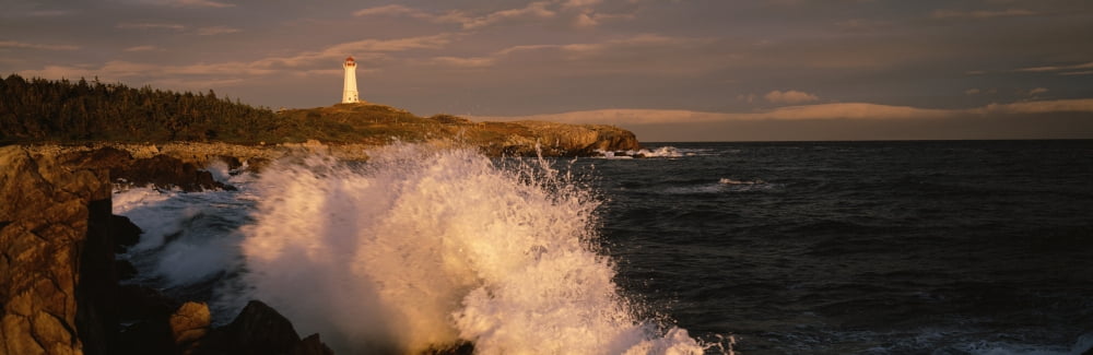Canada Nova Scotia Cape Breton Island Waves breaking on the rocks near Louisbourg lighthouse Canvas Art - Panoramic Images (36 x 12)