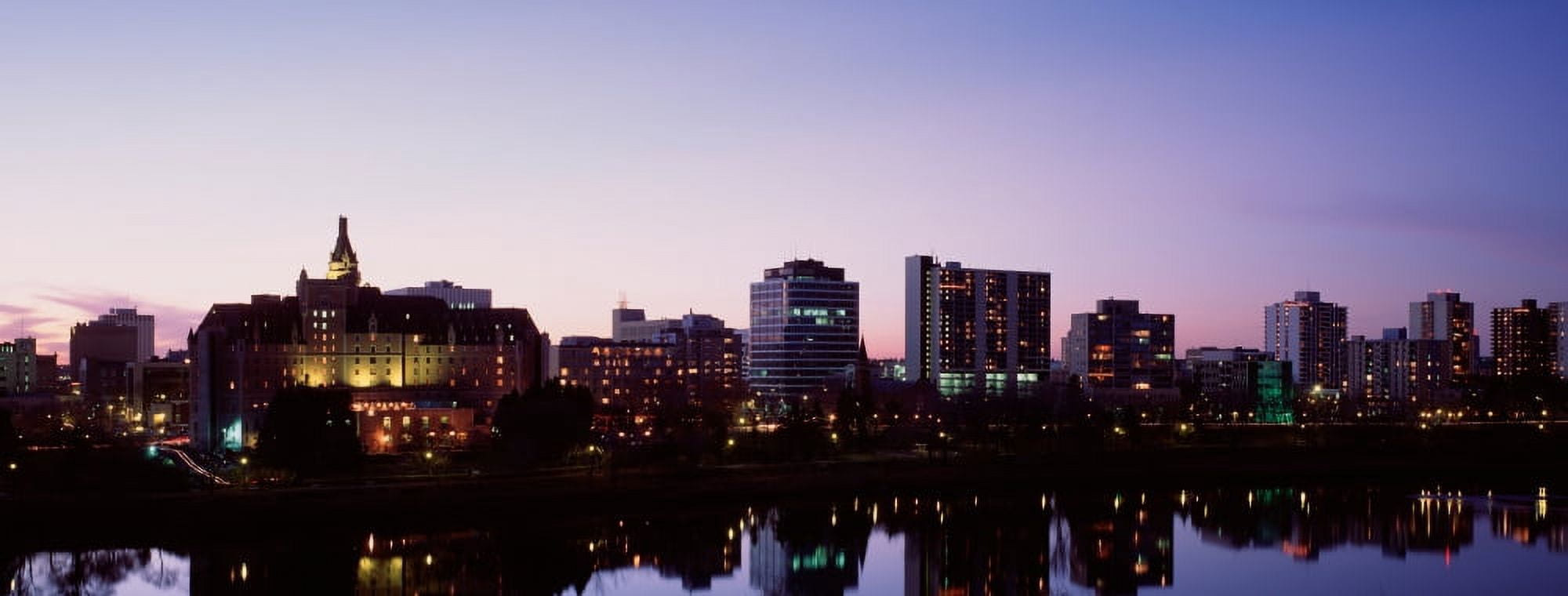 Canada Saskatchewan Saskatoon Buildings along a river Canvas Art - Panoramic Images (27 x 9)