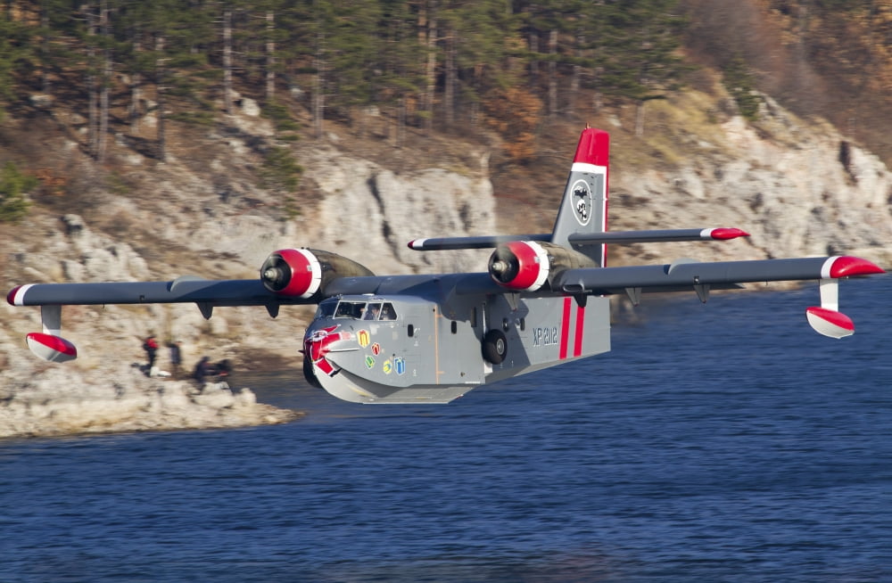 Canadair CL-215-1A10 in flight over Bulgaria Canvas Art - Anton BalakchievStocktrek Images (35 x 23)