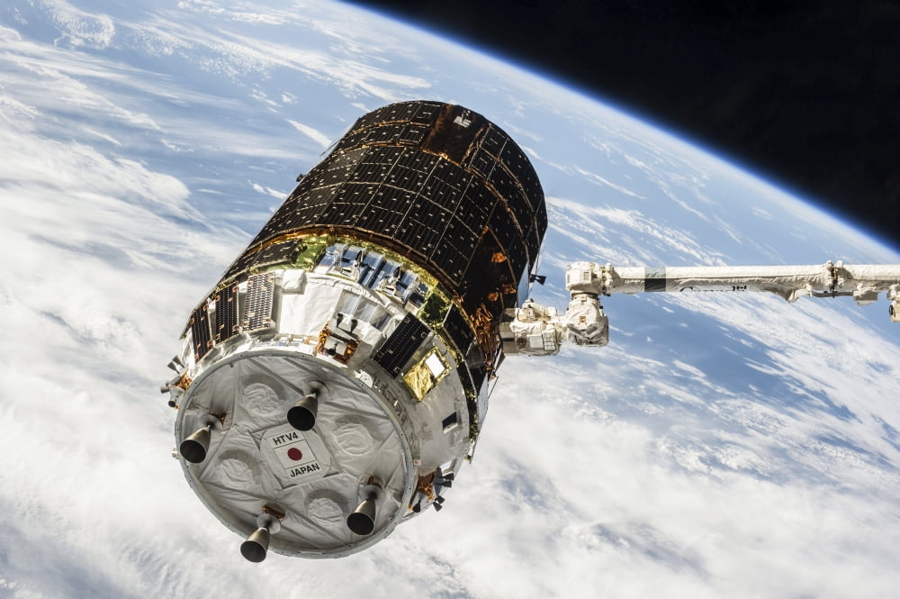 Canadarm2 grapples the unpiloted Japanese Kounotori H2 Transfer Vehicle Canvas Art - Stocktrek Images (35 x 23)