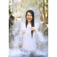 thumbnail image 1 of Canadian-American actress Meg Tilly posing on set of 1988 movie Girl in a Swing getting drenched under a waterfall. Photo: Oscar Abolafia, 1 of 1