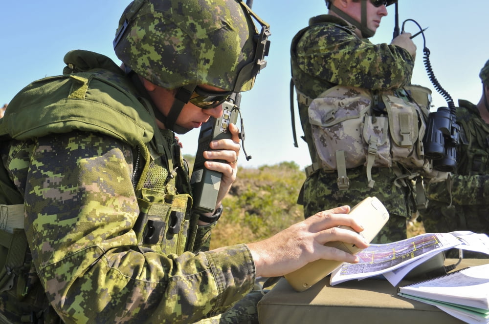 Canadian Army Captain radios a close air support mission Canvas Art - Stocktrek Images (35 x 23)