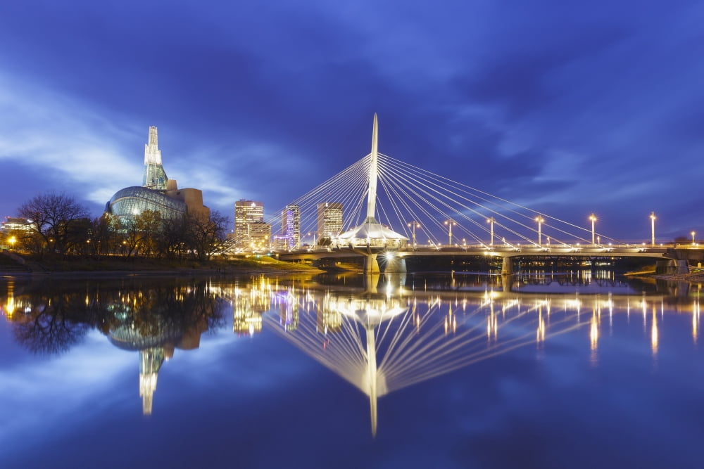 Canadian Museum for Human Rights and Esplanade Riel bridge reflected in the Red River Winnipeg Manitoba Canada Canvas Art - Ken Gillespie Design Pics (19 x 12)