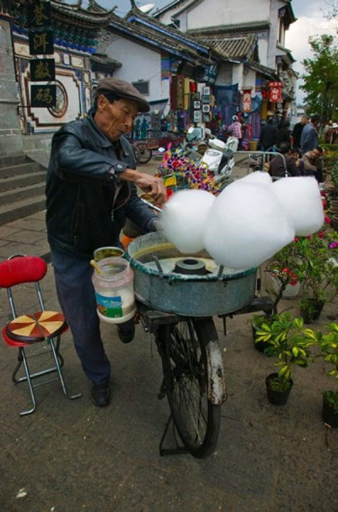 Candy floss vendor selling cotton candies in a street Old Town Dali Yunnan Province China Canvas Art - Panoramic Images (24 x 36)