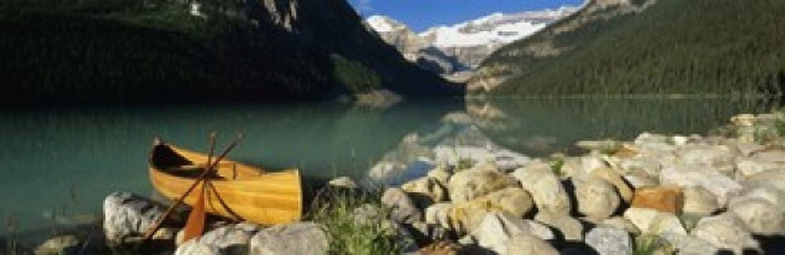 Canoe at the lakeside Lake Louise Banff National Park Alberta Canada Canvas Art - Panoramic Images (18 x 6)