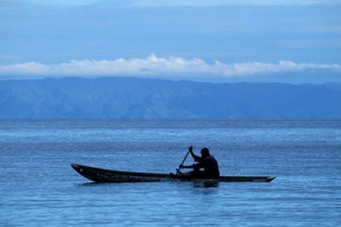 Canoe on Lake Tanganyika Tanzania Canvas Art - Kristin Mosher DanitaDelimont (18 x 12)