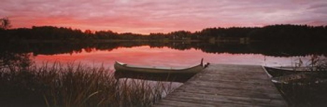 Canoe tied to dock on a small lake at sunset Sweden Canvas Art - Panoramic Images (18 x 6)