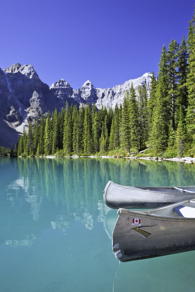 Canoes In Moraine Lake And Valley Of The Ten Peaks Banff National Park Alberta Canvas Art - Ken Gillespie  Design Pics (22 x 34)