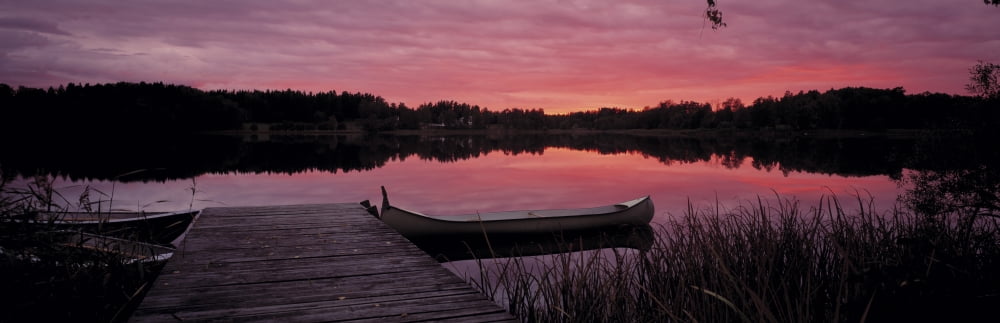 Canoes Lake Yxtaholm Sweden Canvas Art - Panoramic Images (12 x 36)