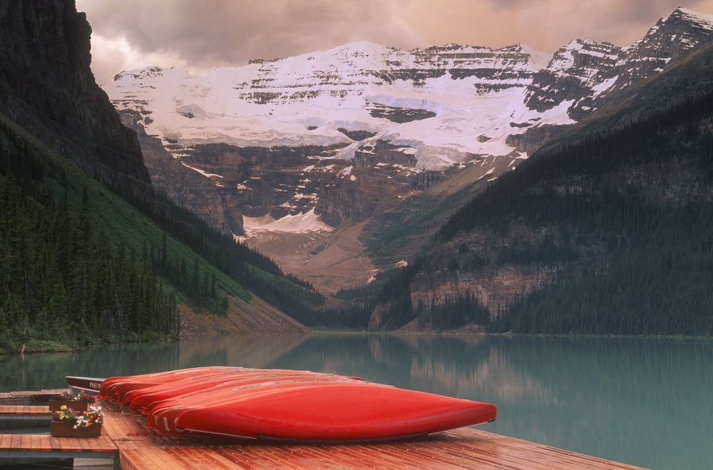 Canoes Lined On A Dock Lake Louise Banff National Park Banff Alberta Canada Canvas Art - Bilderbuch Design Pics (36 x 22)