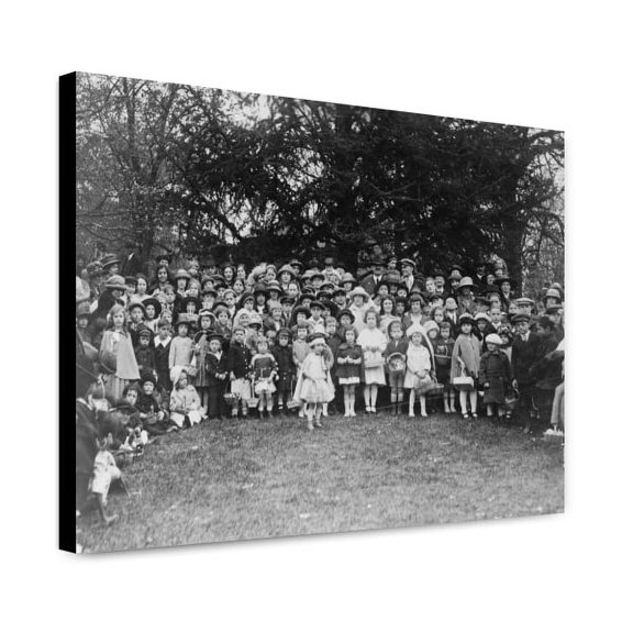 Canvas Print: A Group Of Happy Youngsters Who Rolled Their Easter Eggs On The