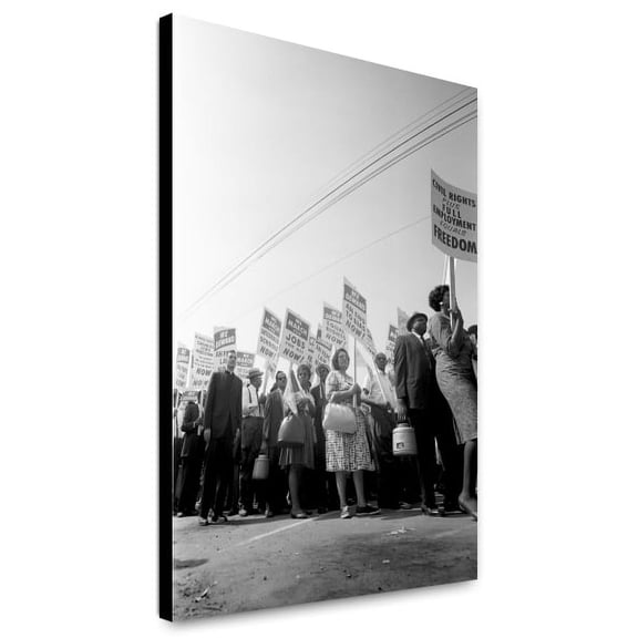 Canvas Print: Demonstrators Marching In The Street Holding Signs During The March
