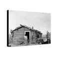 thumbnail image 1 of Canvas Print: Woman And Dog Outside Log Cabin, circa 1900, 1 of 3