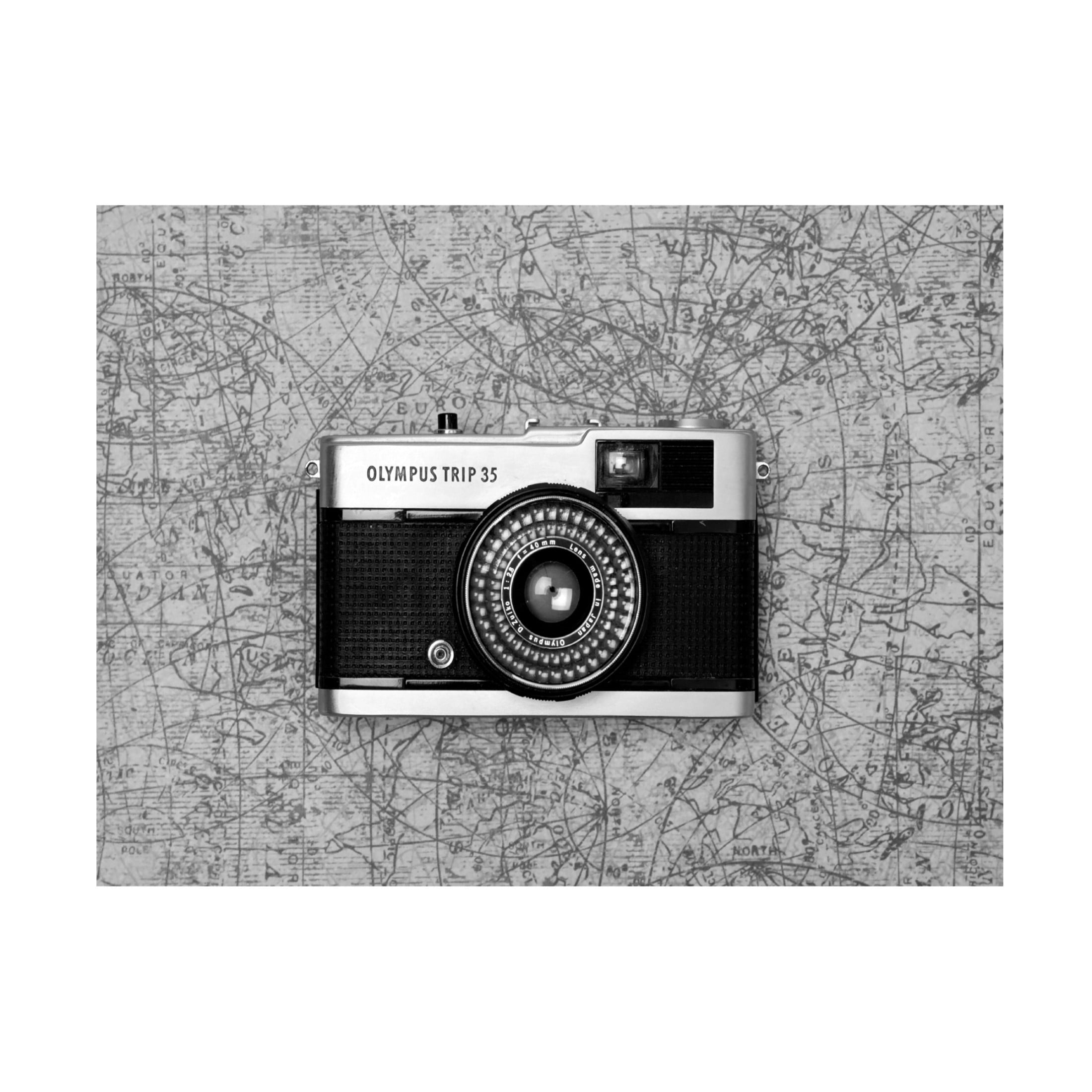 Canvas Wall Art - Tom Quartermaine 'Black and White Camera on Map' Wall Art for Living Room, Bedroom, or Office Décor by Trademark Fine Art - 24 x 18 Inches