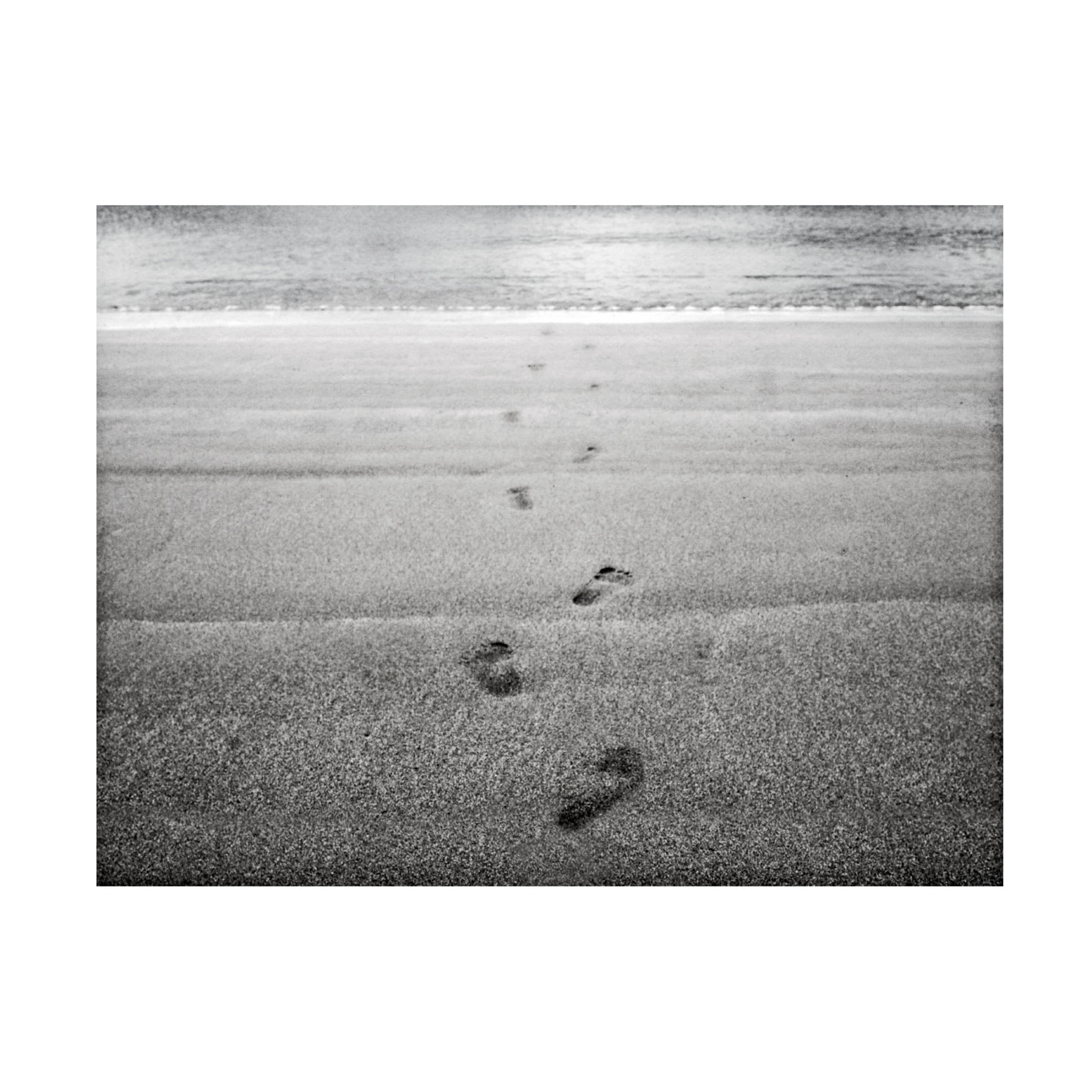 Canvas Wall Art - Tom Quartermaine 'Black and White Footsteps on the Beach' Wall Art for Living Room, Bedroom, or Office Décor by Trademark Fine Art - 24 x 18 Inches