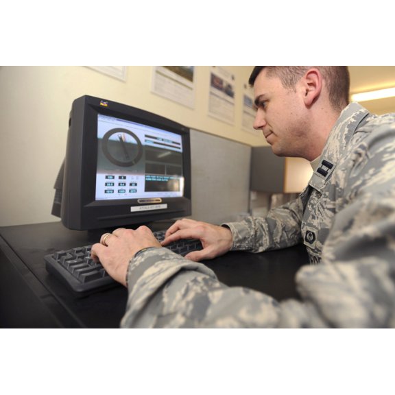 Captain checks readings from an FM-Q19 Airfield Sensor Canvas Art - Stocktrek Images (35 x 23)