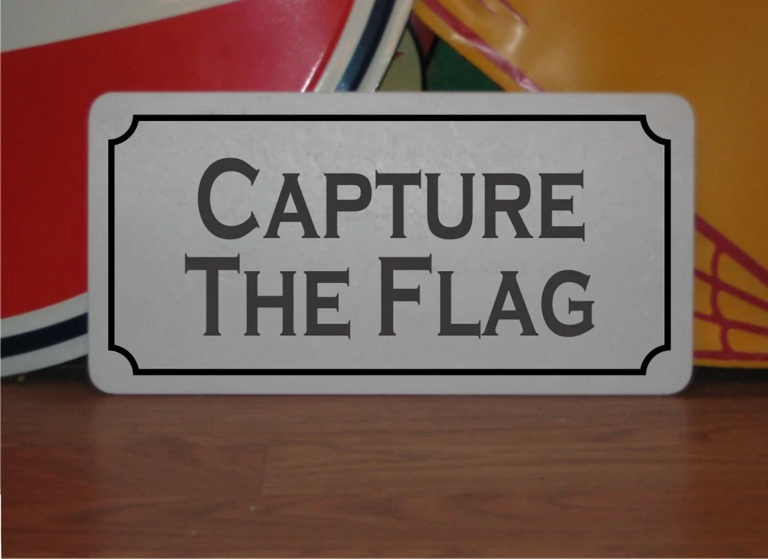 Capture The Flag Metal Sign