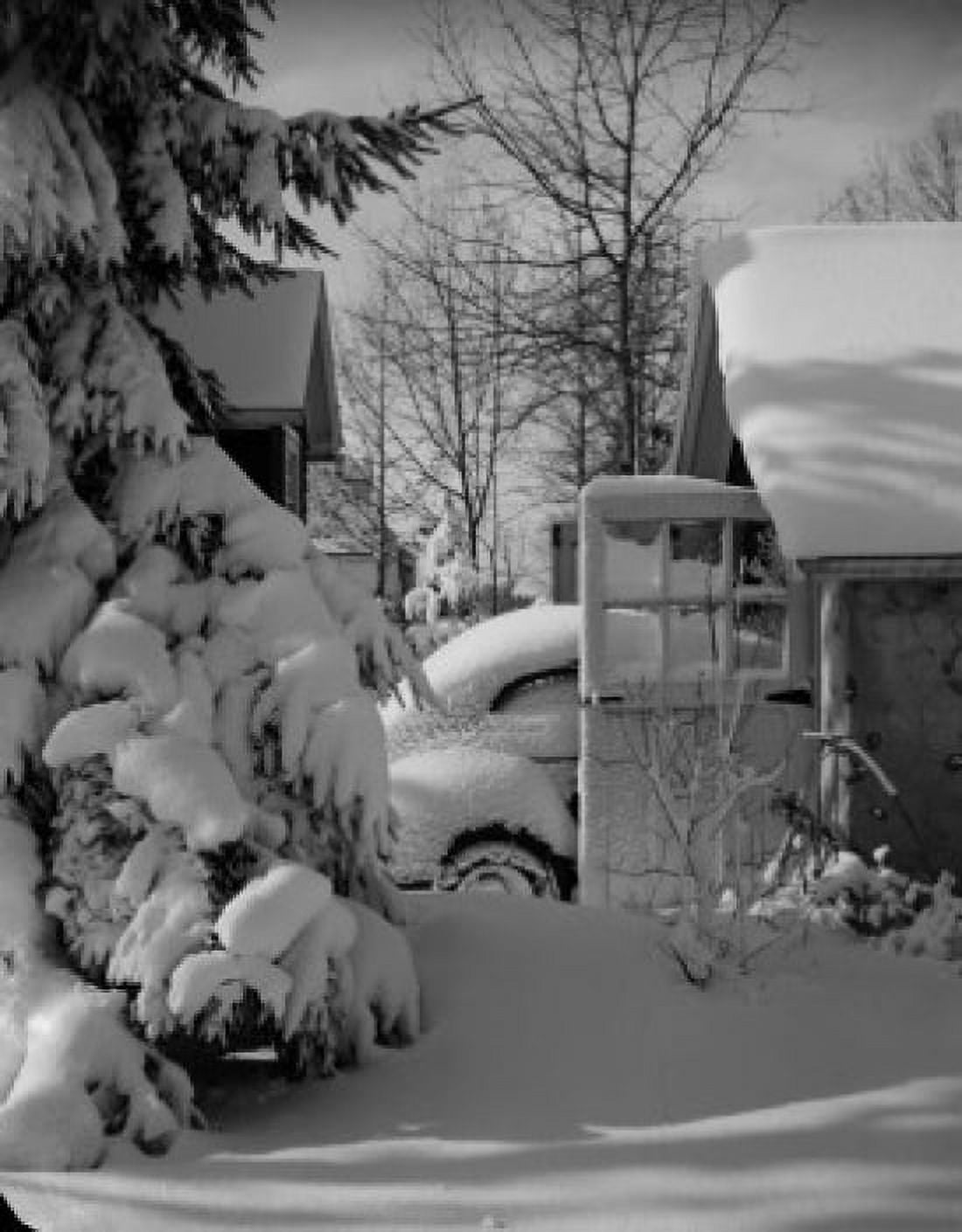 Car covered in snow partially in garage Canvas Art - (18 x 24)
