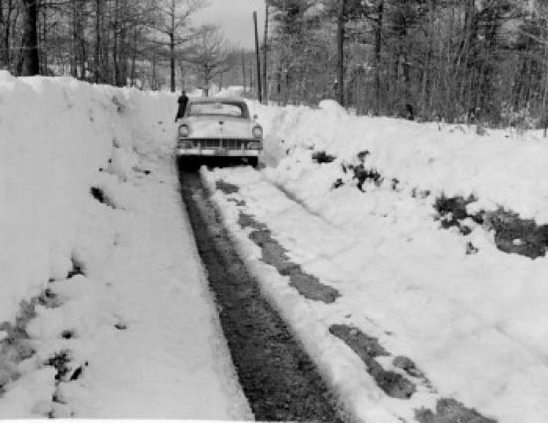 Car on snow covered road Canvas Art - (24 x 36)