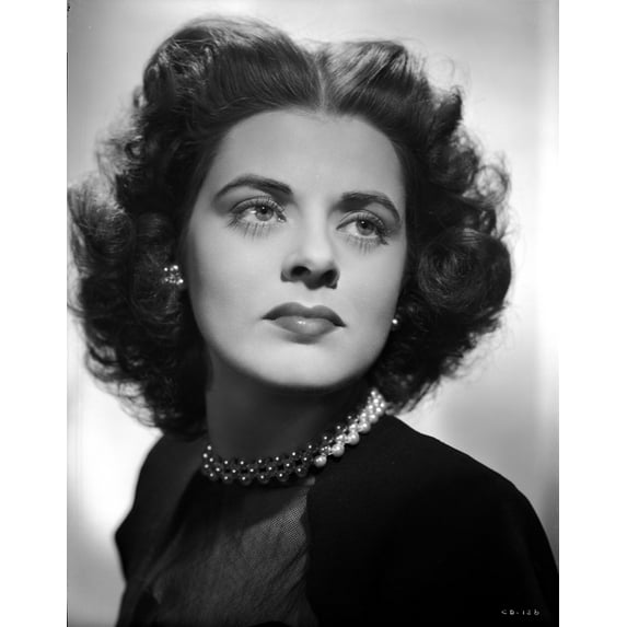 Carol Donell in a Turtle Neck Dress with Necklace Photo Print (24 x 30)