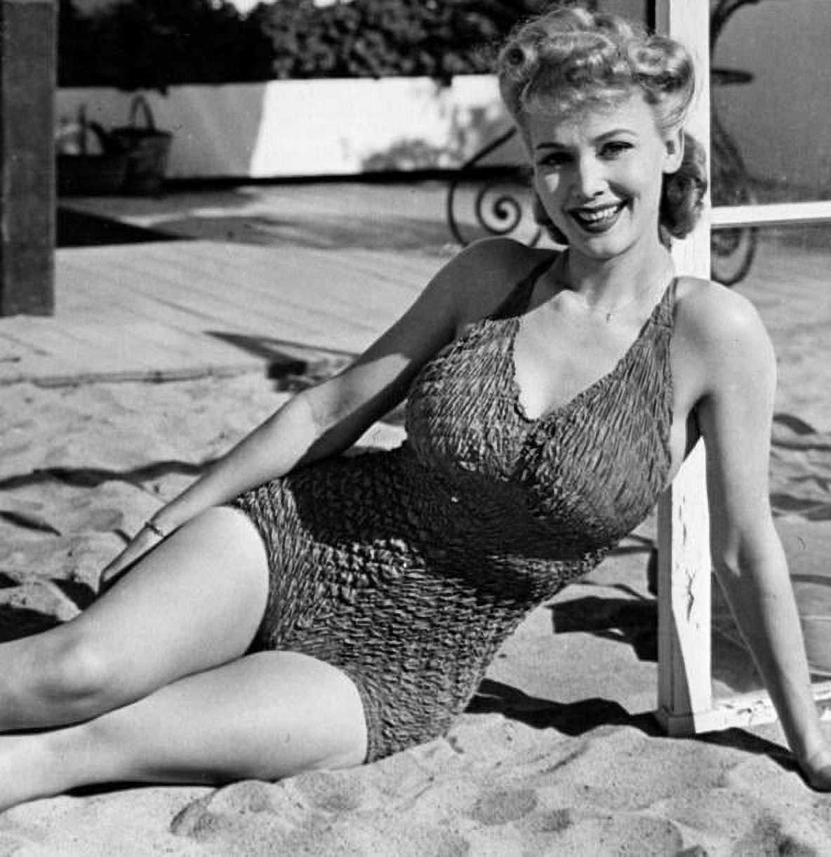 8b20-21542 beautiful and shapely Carole Landis in swimsuit on the diving  board 8