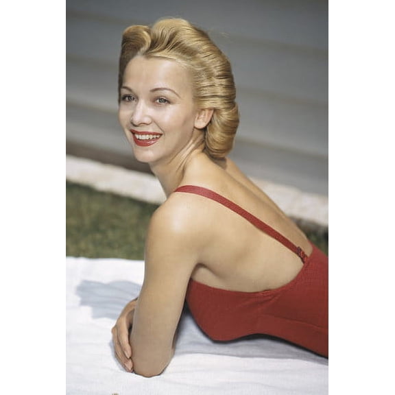 Carole Landis smiling pin-up pose 1940's in red swimsuit lying on towel 24x36 Poster
