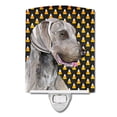 thumbnail image 1 of Caroline's Treasures SC9170CNL Weimaraner Candy Corn Halloween Portrait Ceramic Night Light, 6x4x3", multicolor, 1 of 2