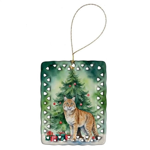 Carolines Treasures DAC7220CO2 3.4 x 2.6 in. Highlander Lynx Cat by the Christmas Tree Porcelain Ornament