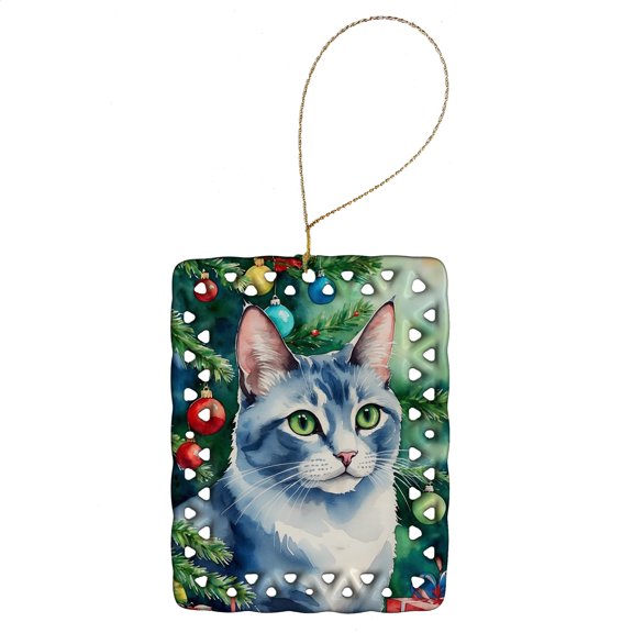 Carolines Treasures DAC7238CO2 3.4 x 2.6 in. Ojos Azules Cat by the Christmas Tree Porcelain Ornament