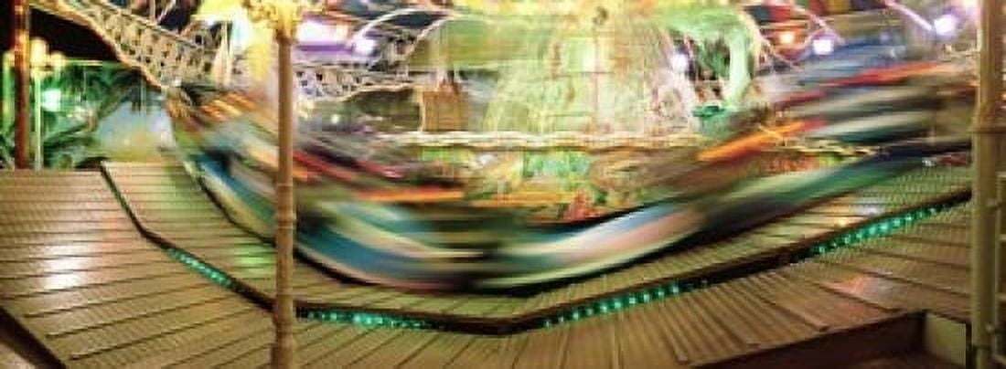 Carousel in motion Amusement Park Stuttgart Germany Canvas Art - Panoramic Images (18 x 7)