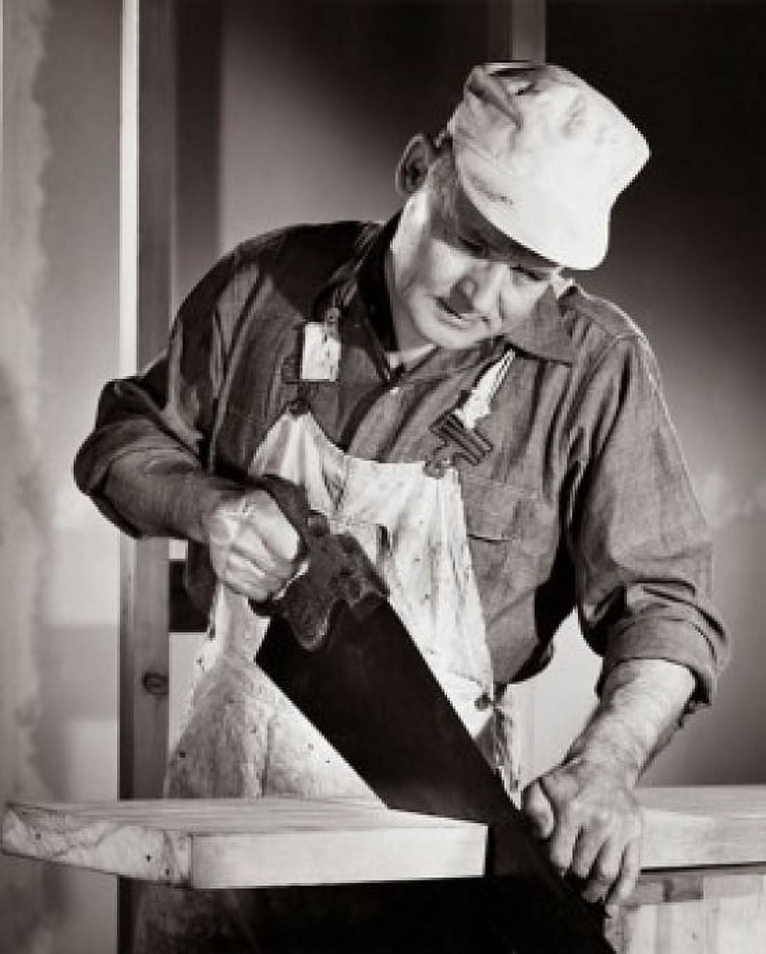 Carpenter sawing a wooden plank Canvas Art - (18 x 24)