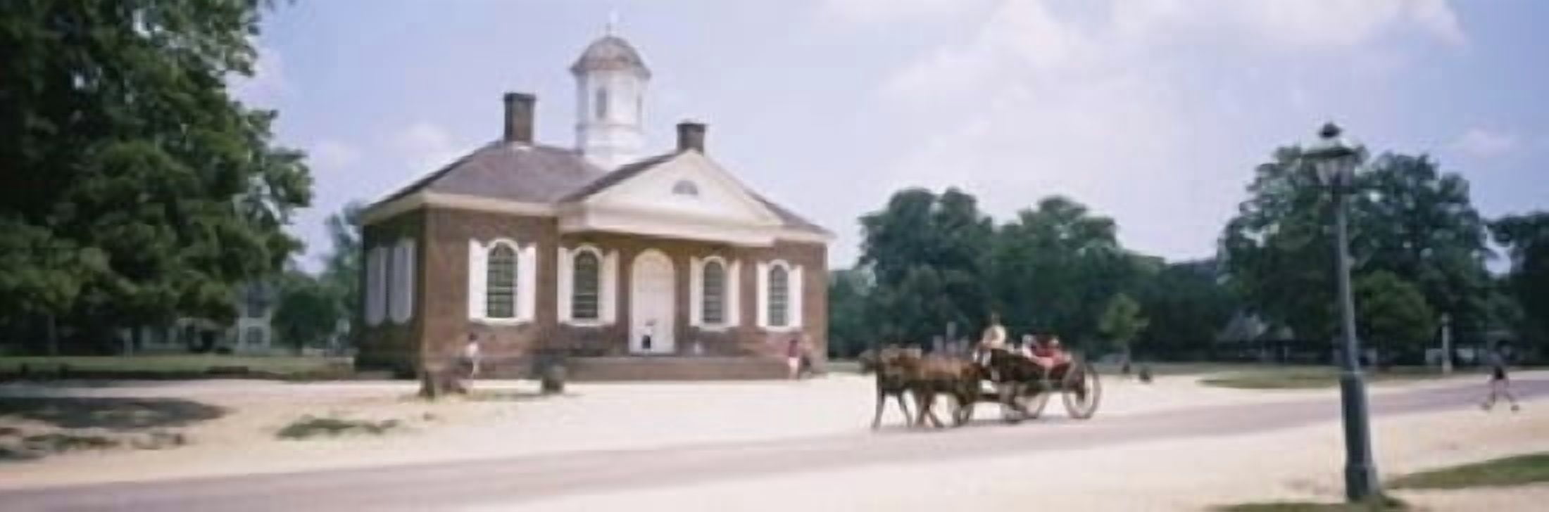 Carriage moving on a road Colonial Williamsburg Williamsburg Virginia USA Canvas Art - Panoramic Images (36 x 12)