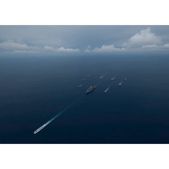 Carrier Strike Group formation of ships in the Bay of Bengal Poster Print by Stocktrek Images (34 x 22)